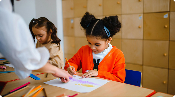 Two children colouring